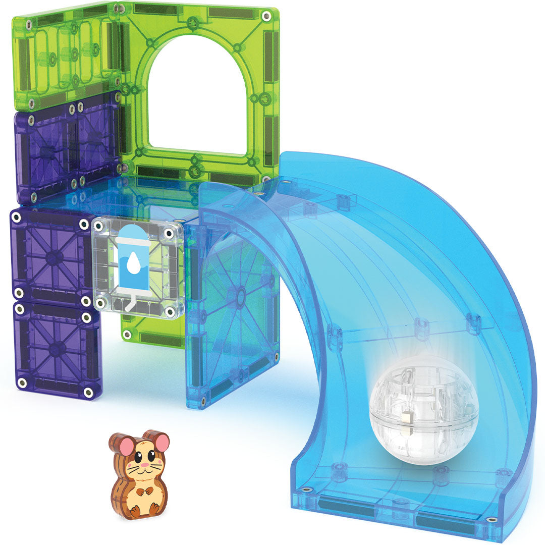 De Magna-Tiles Hamster Ball set met groene en paarse magnetische tegels, een blauwe baan en een hamsterfiguur.