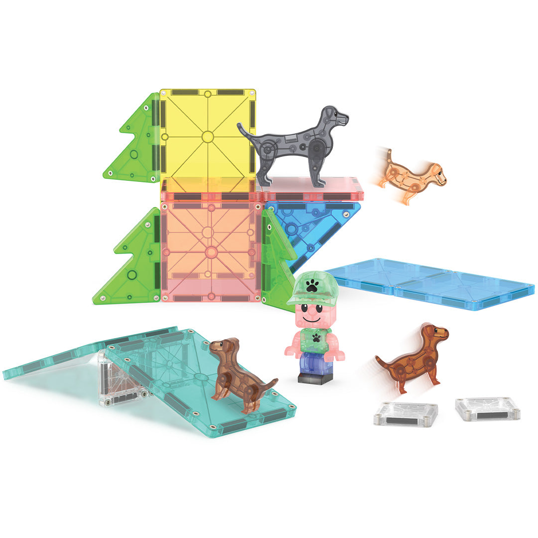 Magna-Tiles Puppy Park bouwset met losse magnetische tegels, een boom, kindfiguur en puppy's.