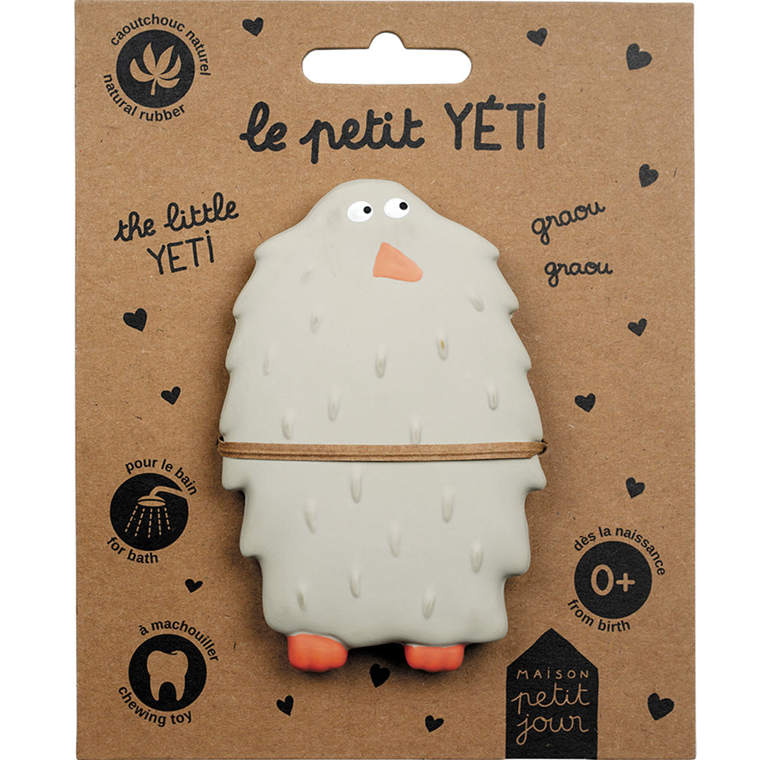 De verpakking van het Maison Petit Jour bad- en bijtspeelgoed in de vorm van een beige yeti.