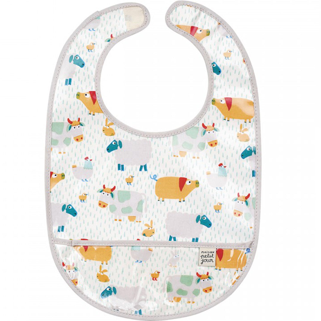 Maison Petit Jour baby slabbetje met een kleurrijk boerderijdierenpatroon.