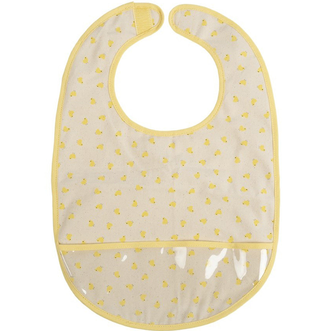 Maison petit jour babyslab met beige stof, geel kuikenpatroon en een doorzichtig opvangzakje.