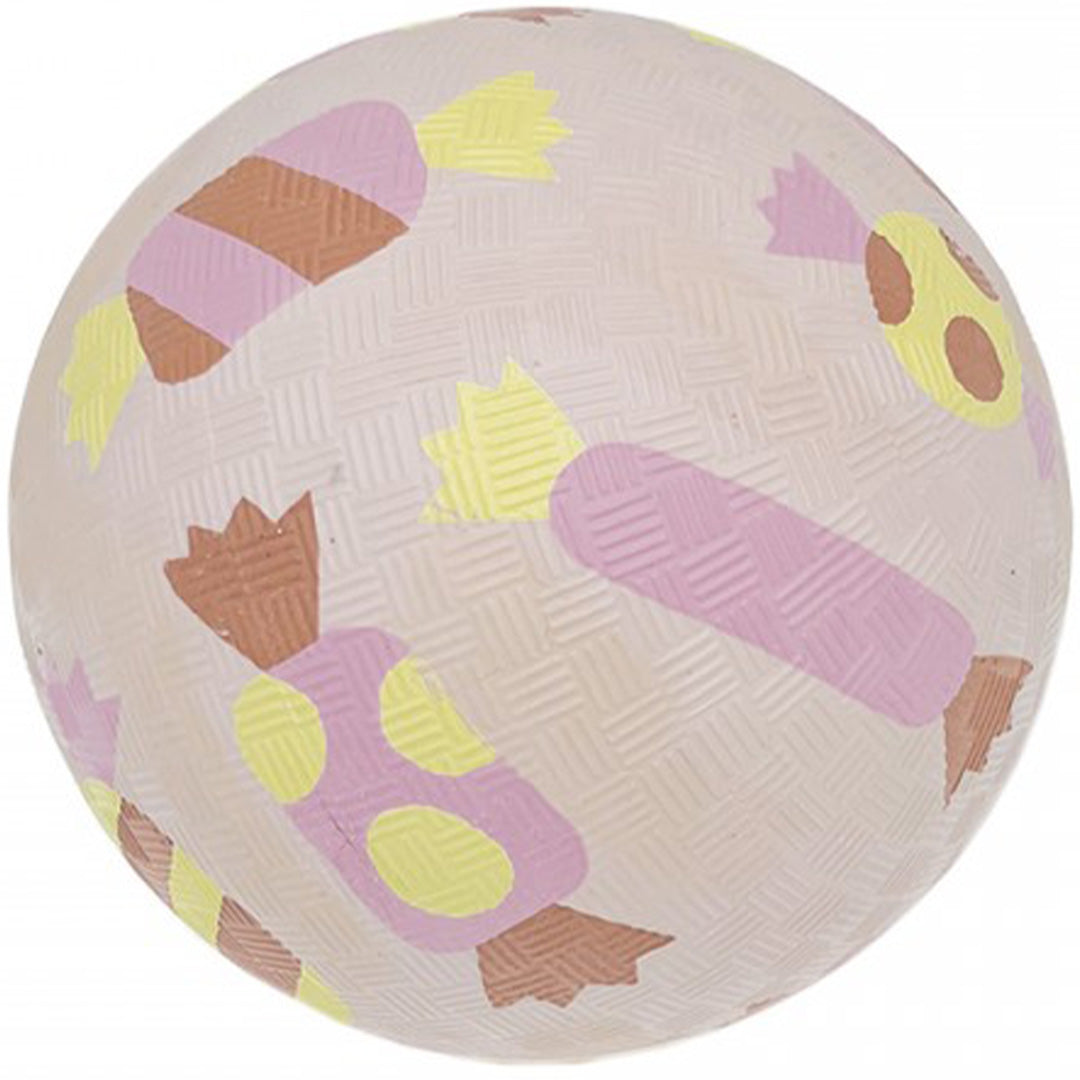Maison Petit Jour beige rubberen speelbal met een patroon van kleurrijke snoepjes.