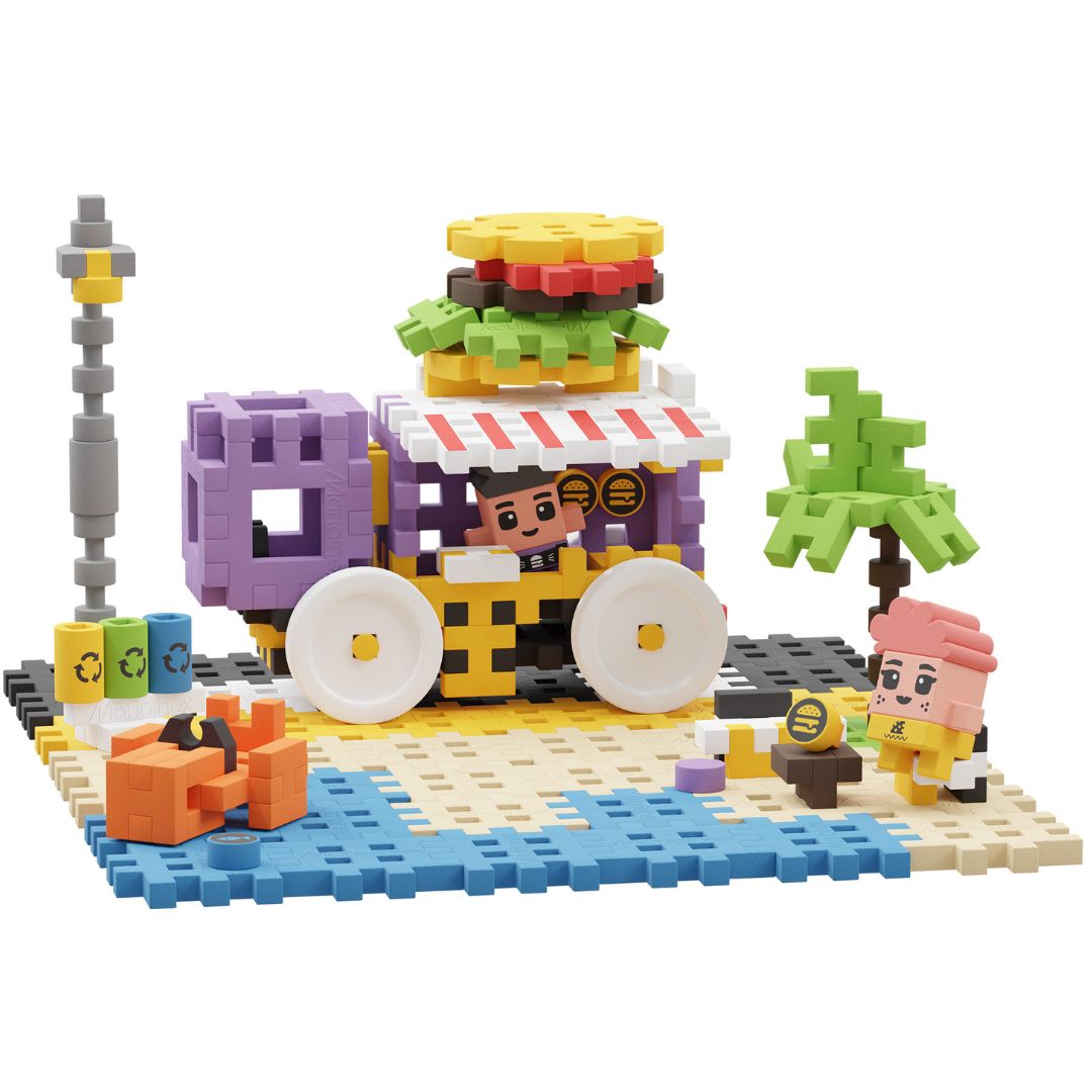 Marioinex bouwblokken set van een food truck op een strand met twee figuren.