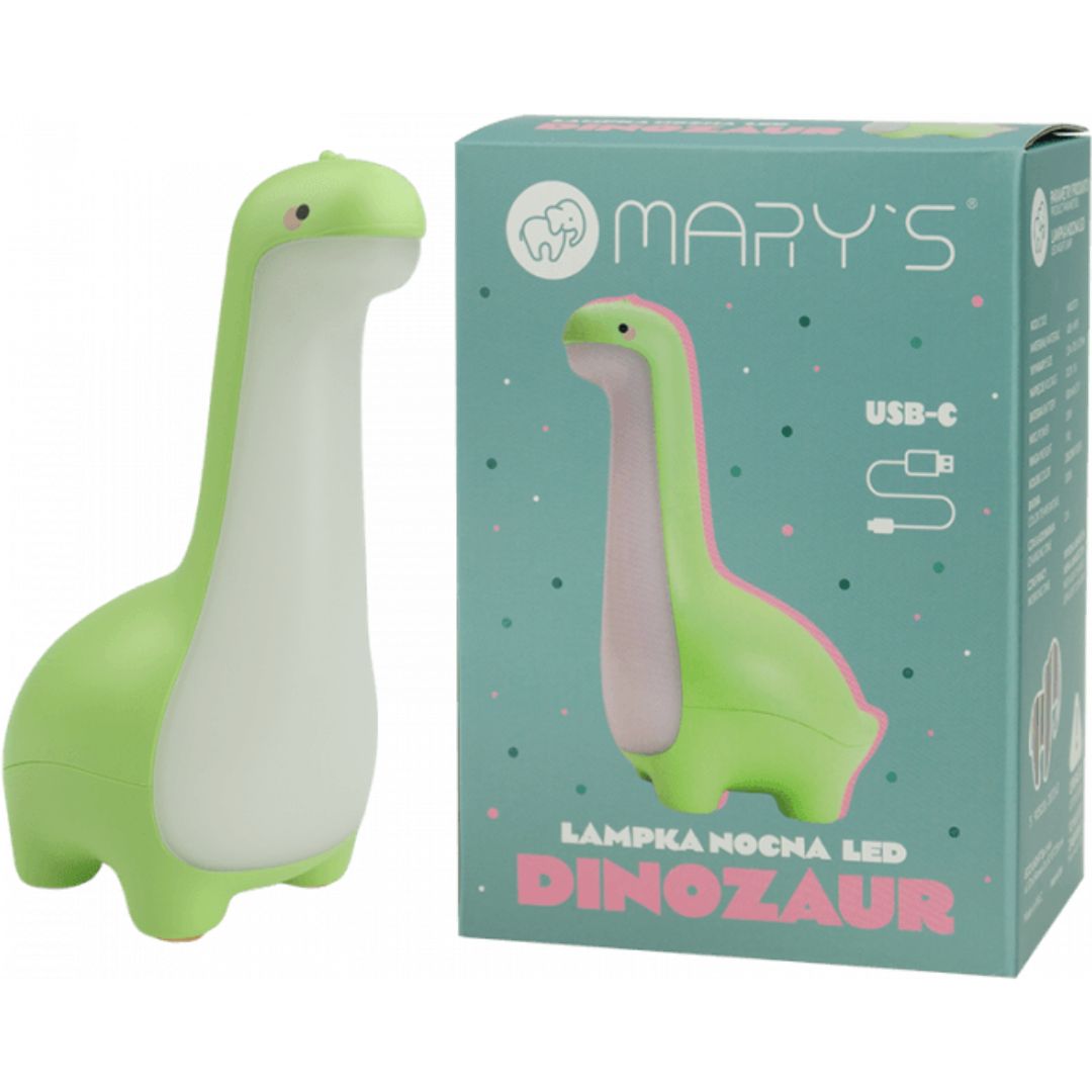 Mary's groene dinosaurus nachtlampje naast de verpakking.