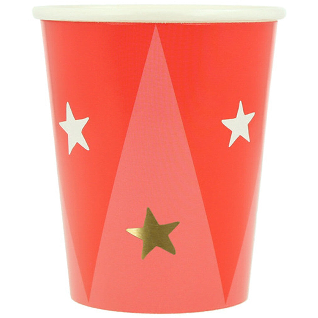 Een enkele Meri Meri papieren feestbeker met circus thema in rood en roze met witte en gouden sterren.