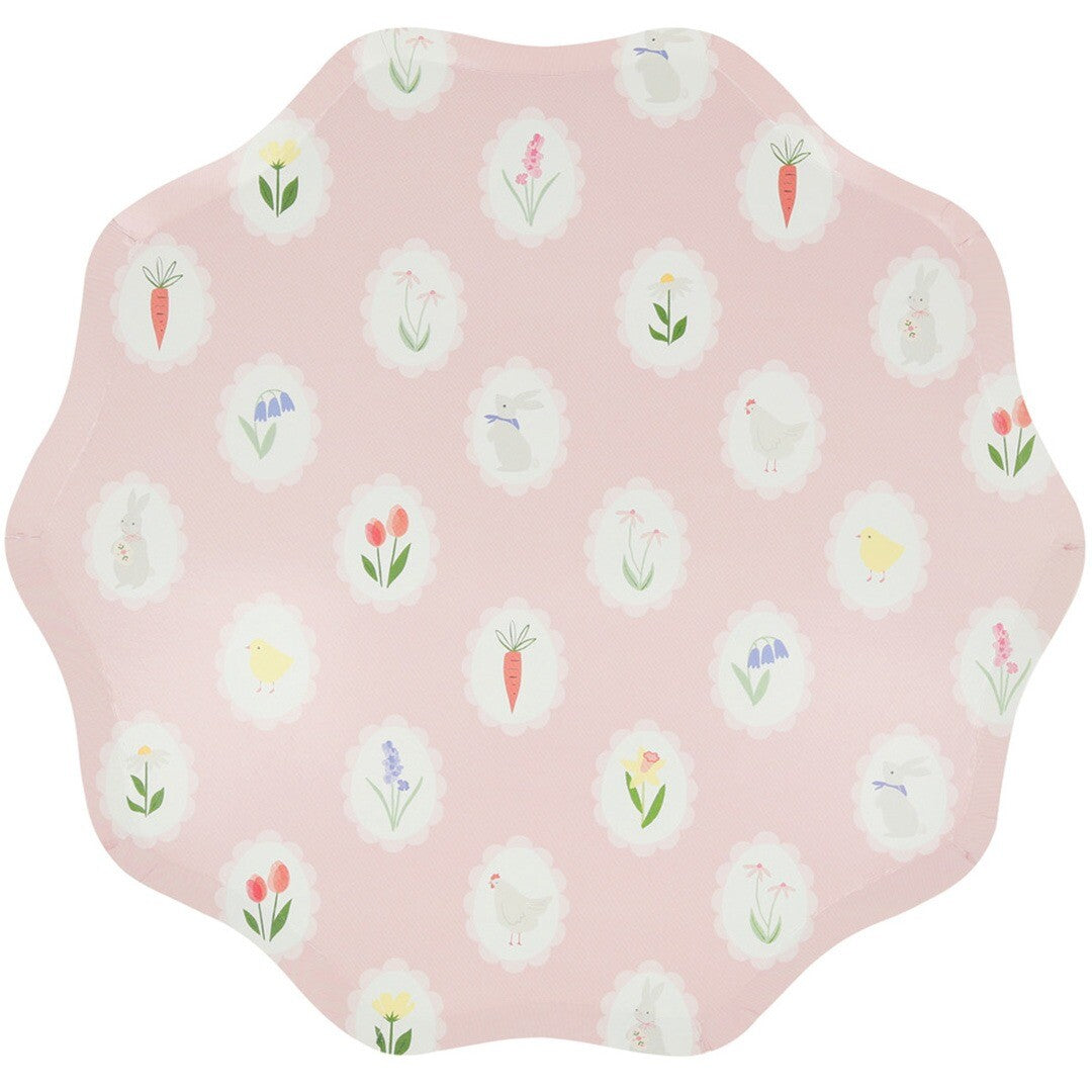 Meri Meri roze paasbord met konijnen, kuikens, wortels en bloemen in een patroon.