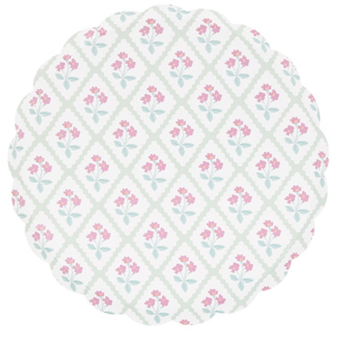 Een Meri Meri papieren bordje met een lichtgroen geometrisch patroon van ruiten en roze bloemen.