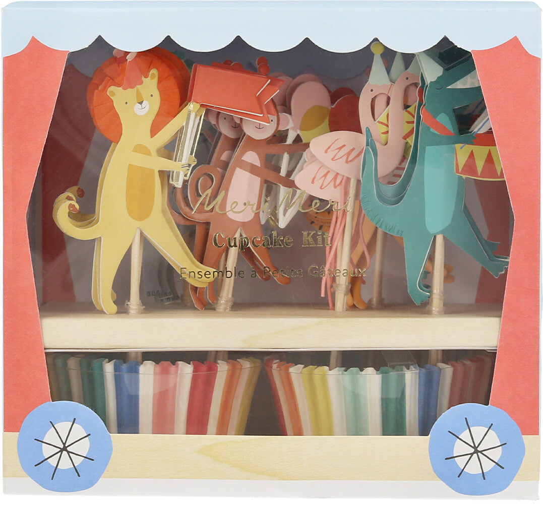 Verpakking van de Meri Meri cupcake kit met dierenparade thema, inclusief dierentopper en gestreepte cupcakevormpjes.