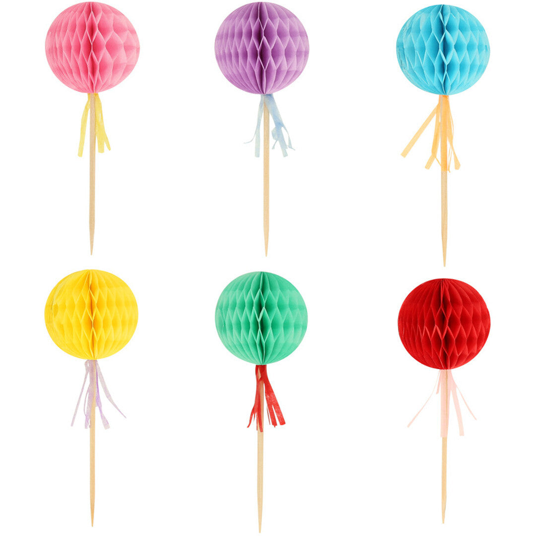 Zes Meri Meri honeycomb bal cupcake toppers in verschillende kleuren.