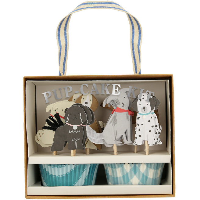 Meri Meri cupcake set puppy in de verpakking, met diverse honden toppers en blauwe cupcake vormpjes.