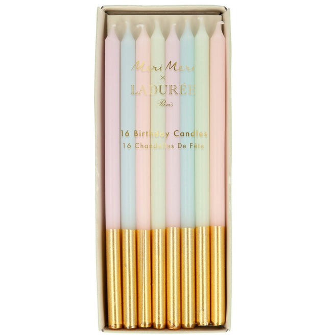 Verpakking van Meri Meri Ladurée Paris verjaardagskaarsen in pastelkleuren met gouden onderkant.