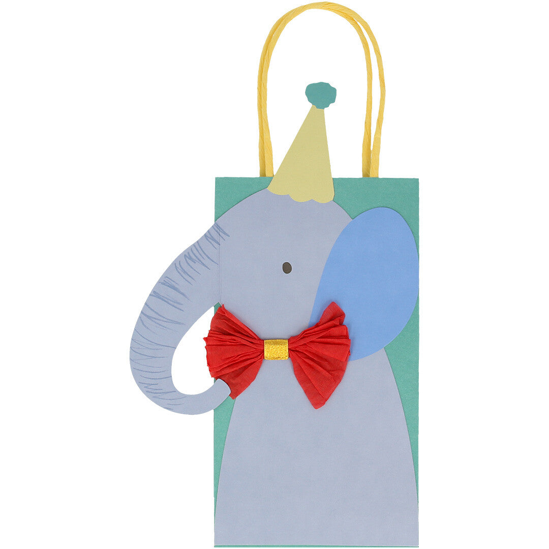 Een feesttasje met een olifant met rode strik en geel feesthoedje.