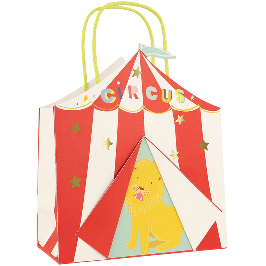 Meri Meri cadeautasje in de vorm van een rood-wit gestreepte circustent met een leeuw en gouden sterren.