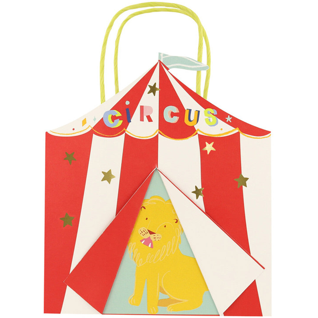 Meri Meri cadeautasje in de vorm van een rood-wit gestreepte circustent met een leeuw en gouden sterren.