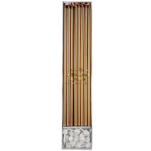 Meri Meri verpakking met lange gouden metallic feestkaarsjes en witte houders.