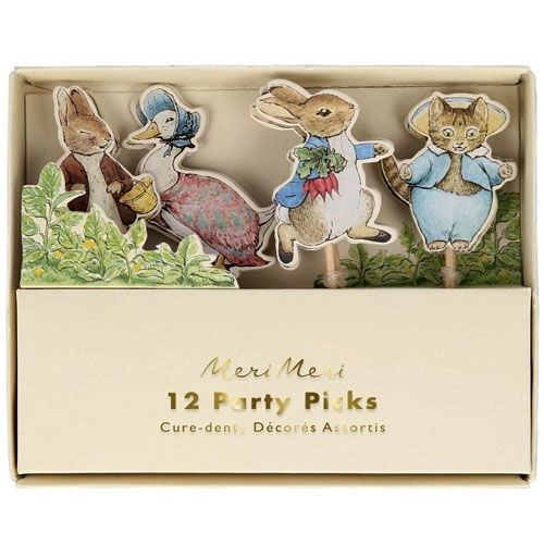Meri Meri feestprikkers met Pieter Konijn en andere dierenfiguren, getoond in de verpakking.