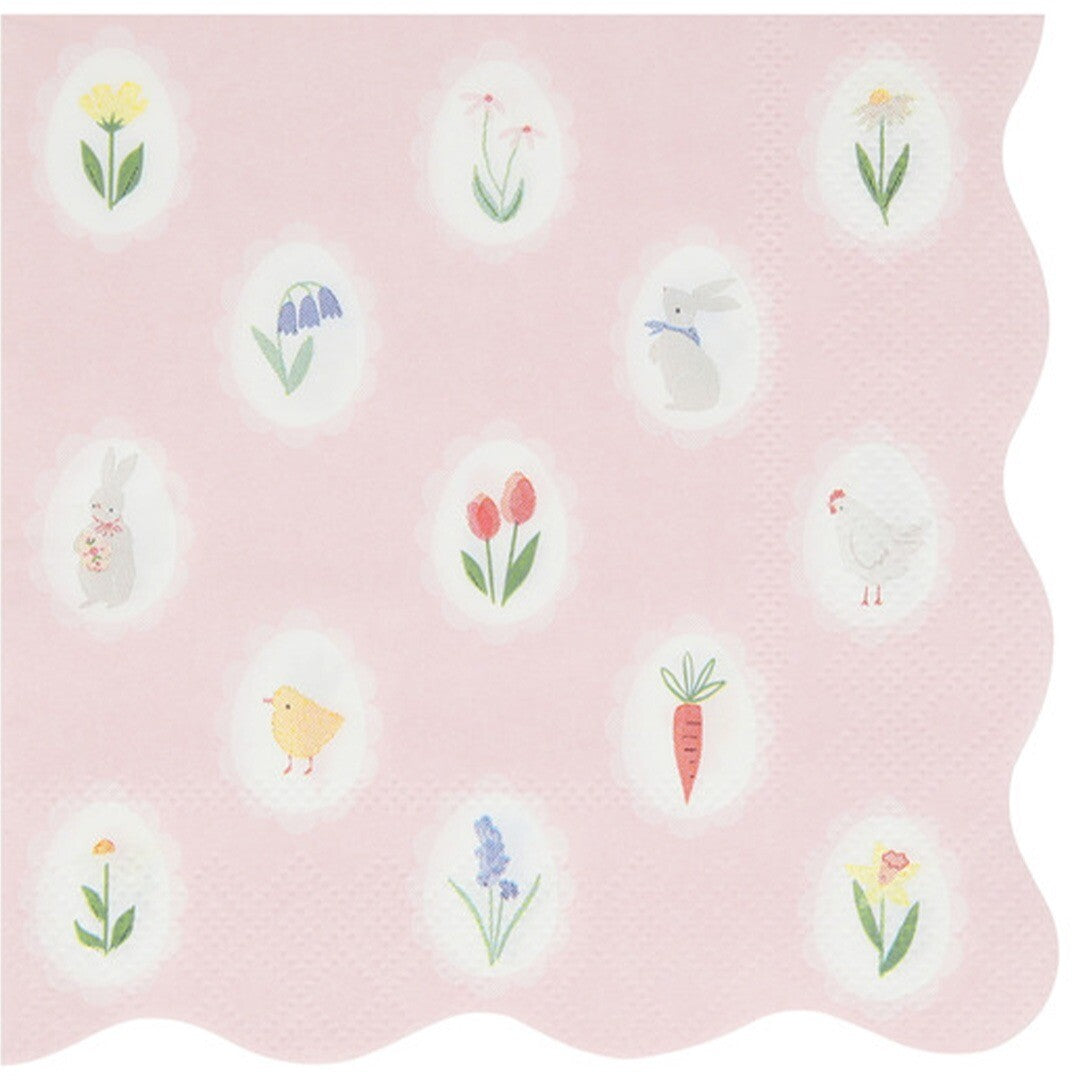 Meri Meri paasservet met roze achtergrond en illustraties van paasfiguren, een wortel en bloemen in ovale kaders.