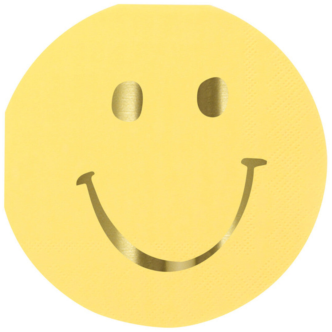 Een Meri Meri papieren servet in de vorm van een gele smiley met goudkleurige ogen en mond.