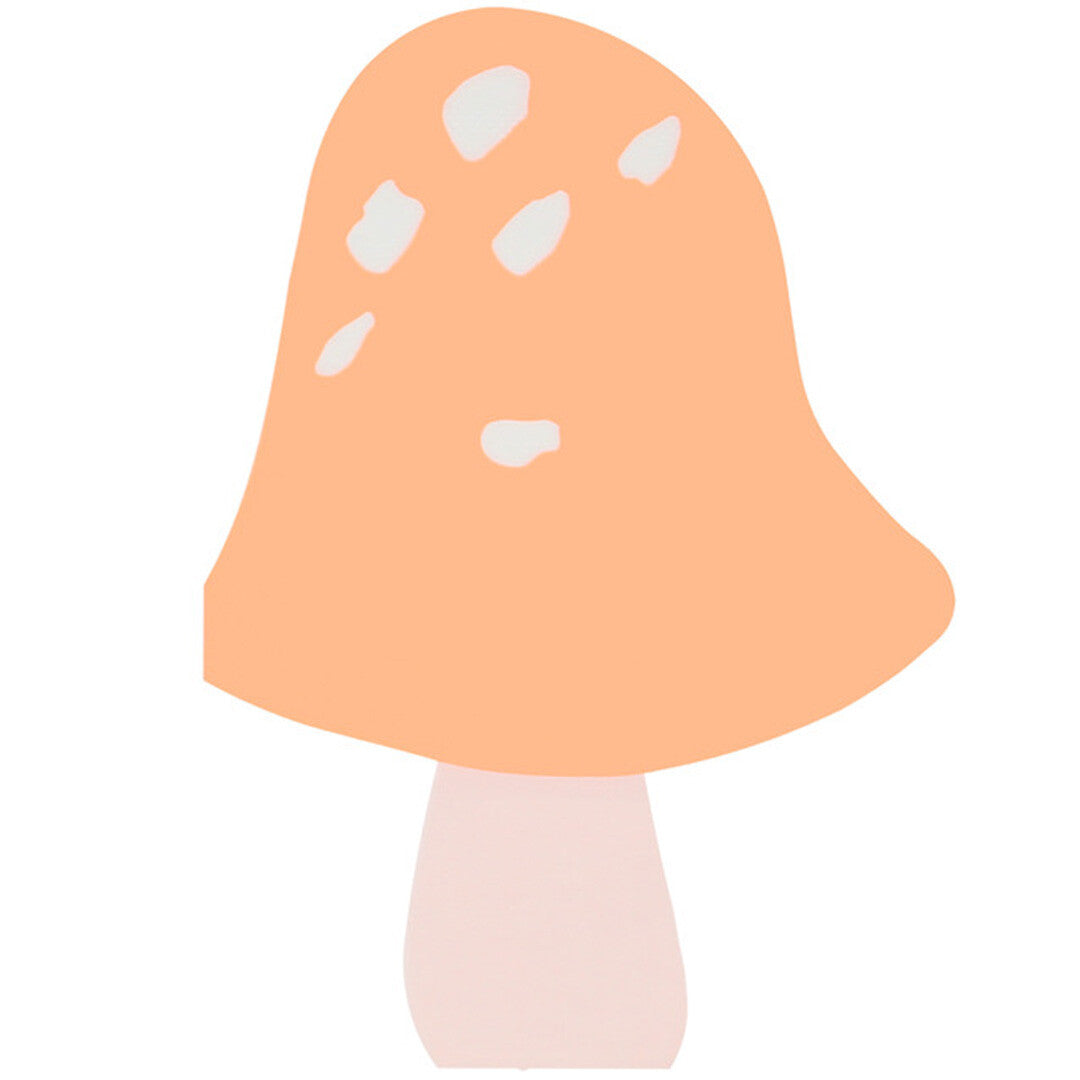 Een Meri Meri papieren servet in de vorm van een oranje paddenstoel met witte stippen.