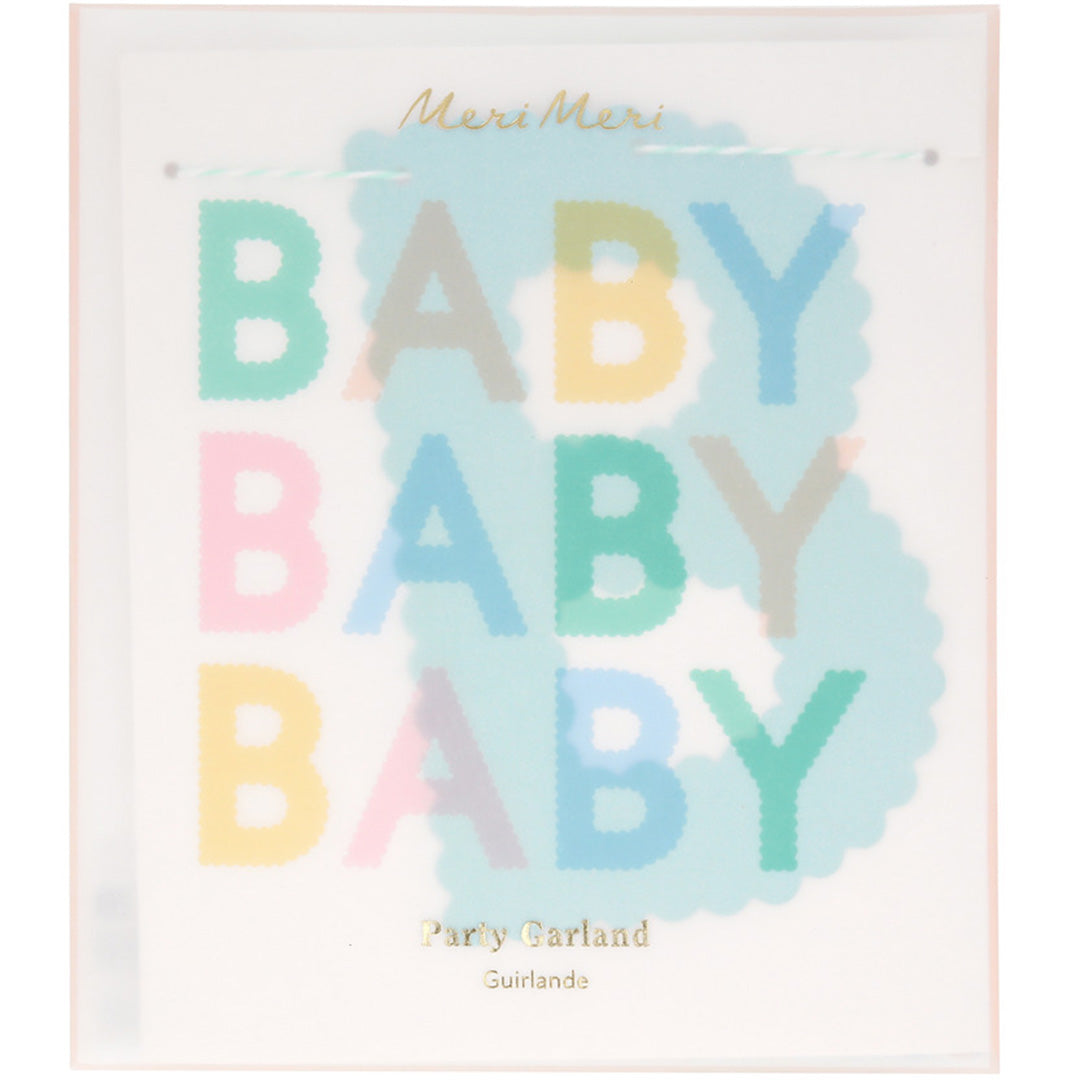 Verpakking van de Meri Meri slinger met de tekst 'BABY BABY BABY' in pastelkleuren.