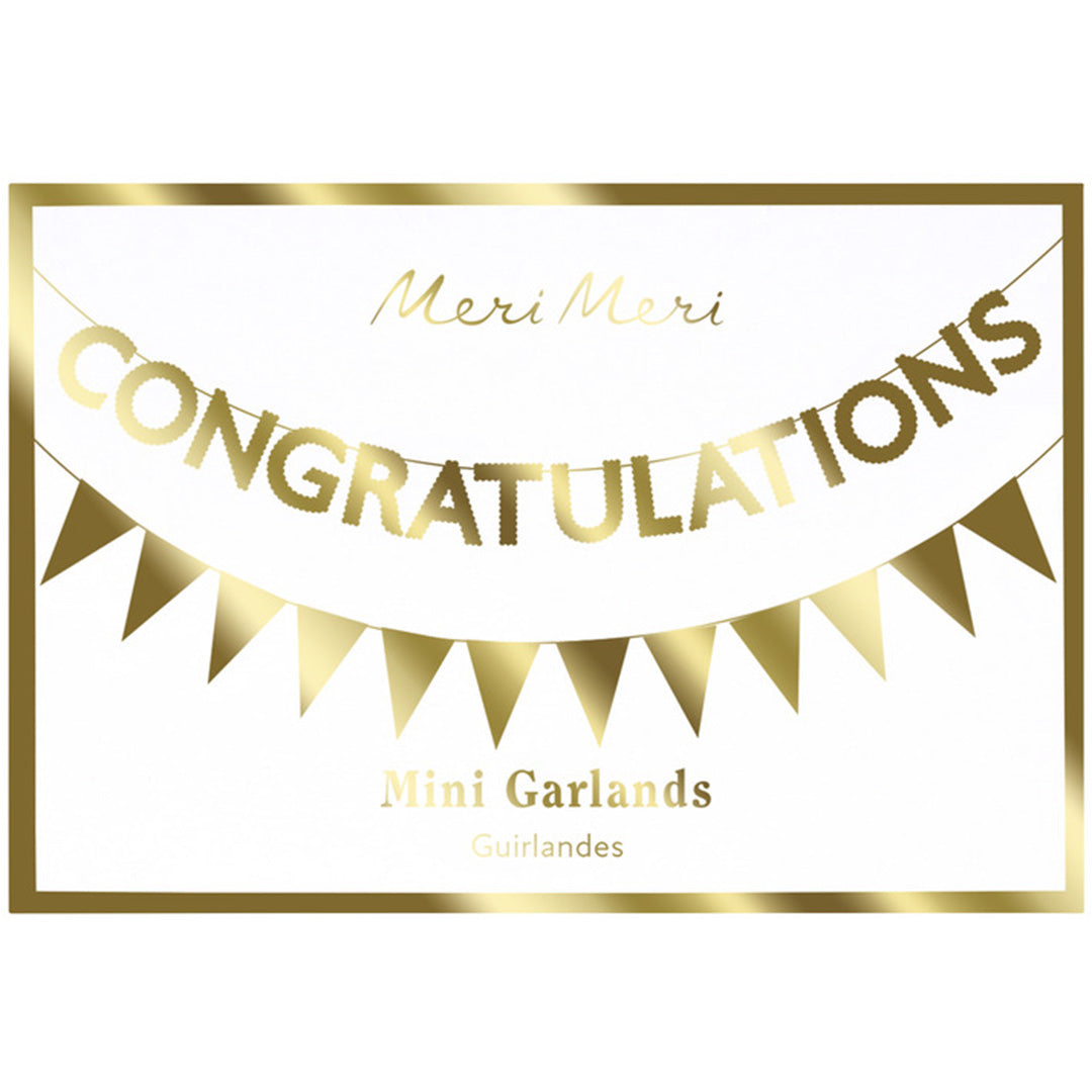 Verpakking van de Meri Meri gouden 'CONGRATULATIONS' slinger met vlaggetjes.