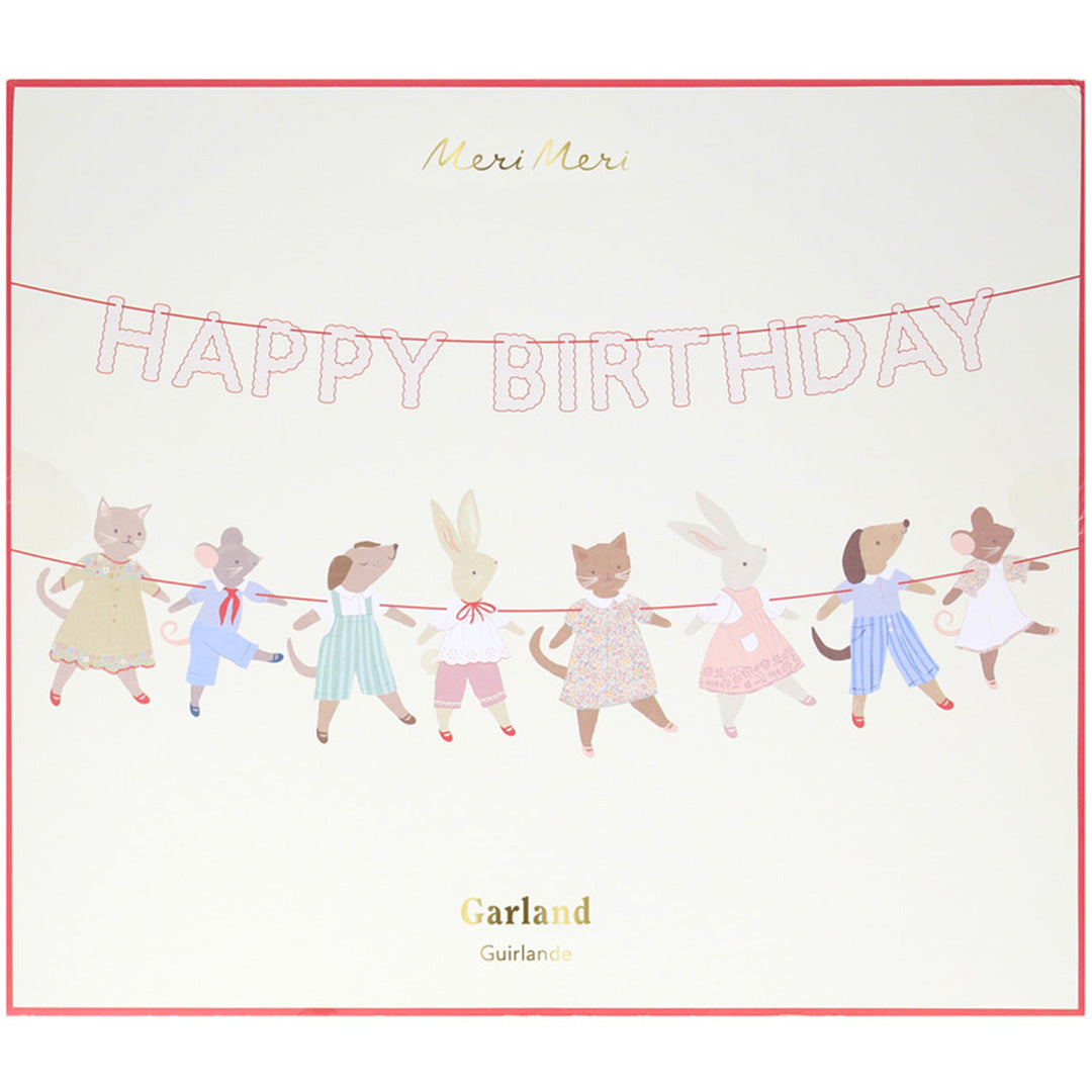 Verpakking van de Meri Meri Happy Birthday slinger met dierenfiguren.