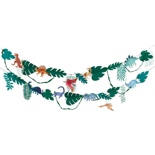 Meri Meri dinosaurus feestslinger met groene bladeren en diverse kleurrijke dinosaurusfiguren tegen een witte achtergrond.