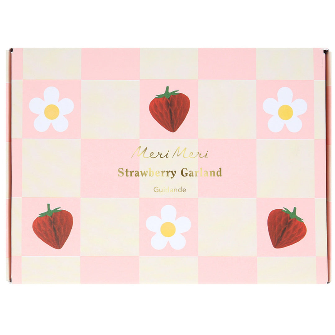 Verpakking van de Meri Meri Strawberry Garland met aardbeien en bloemen.