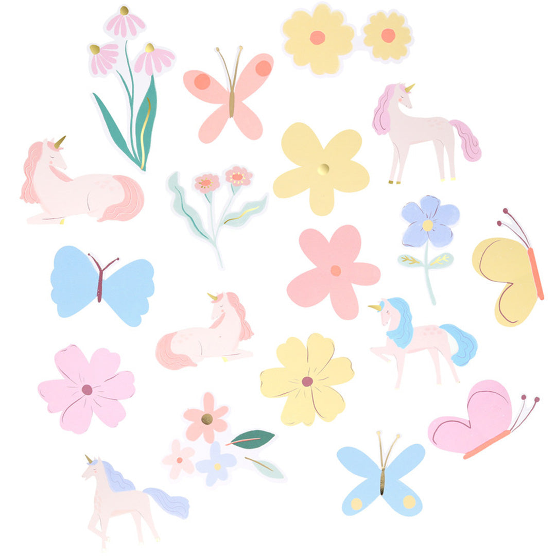 Een platte weergave van Meri Meri stickers met eenhoorns, vlinders en bloemen.