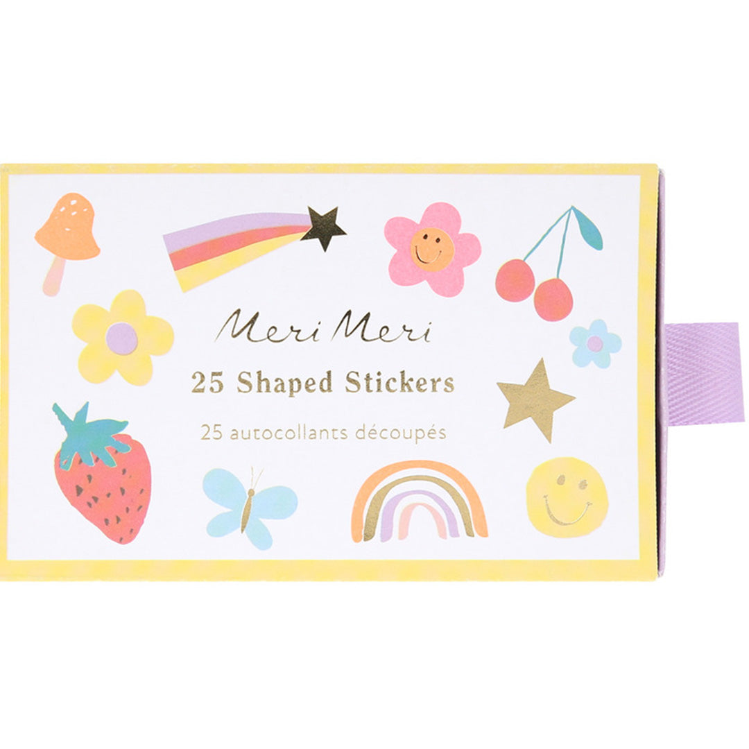 Meri Meri stickers verpakking met diverse vrolijke iconen zoals bloemen, een regenboog en een aardbei.
