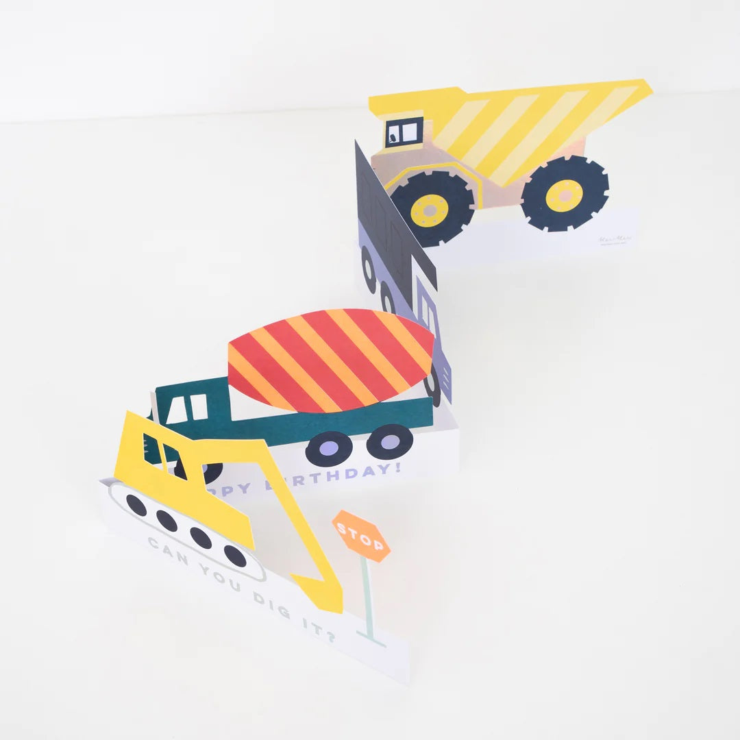 Meri Meri pop-up verjaardagskaart met kleurrijke bouwvoertuigen in een zigzaggende opstelling.