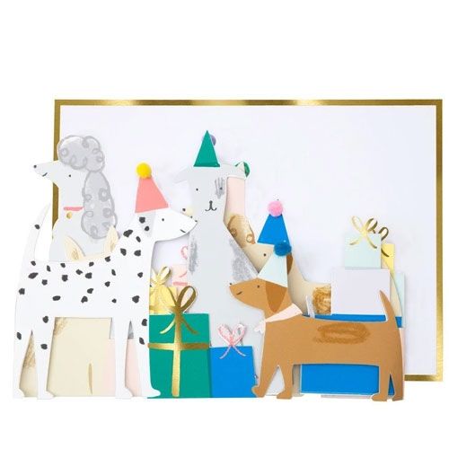 Meri Meri verjaardagskaart met een close-up van de uitklapbare hondenfiguren en cadeautjes.