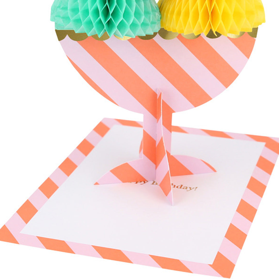 Detail van de geopende Meri Meri pop-up verjaardagskaart met een ijscoupe en de tekst 'Happy Birthday!'.