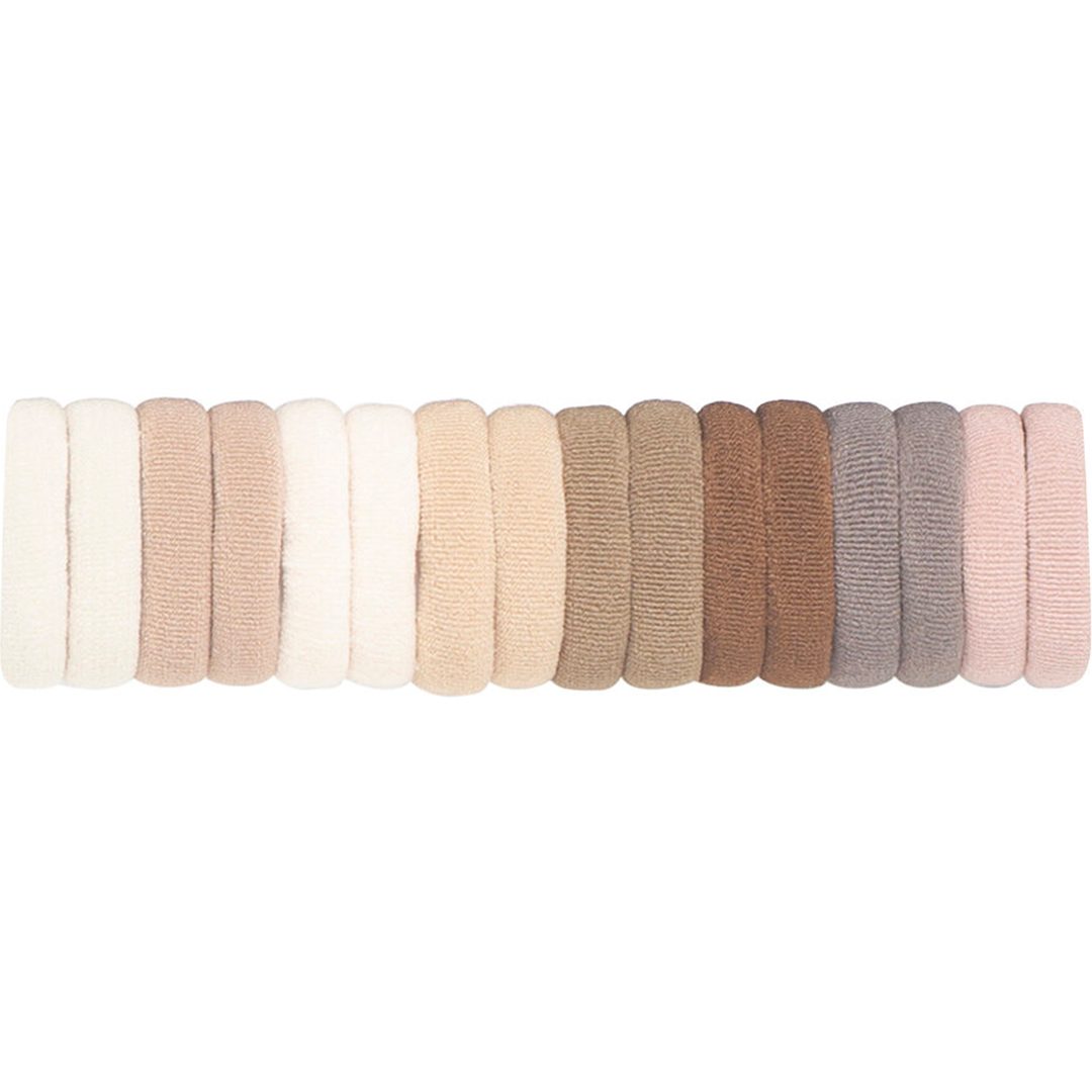 Een rij van 16 mimi & lula badstof haarelastiekjes in diverse beige en bruine tinten.