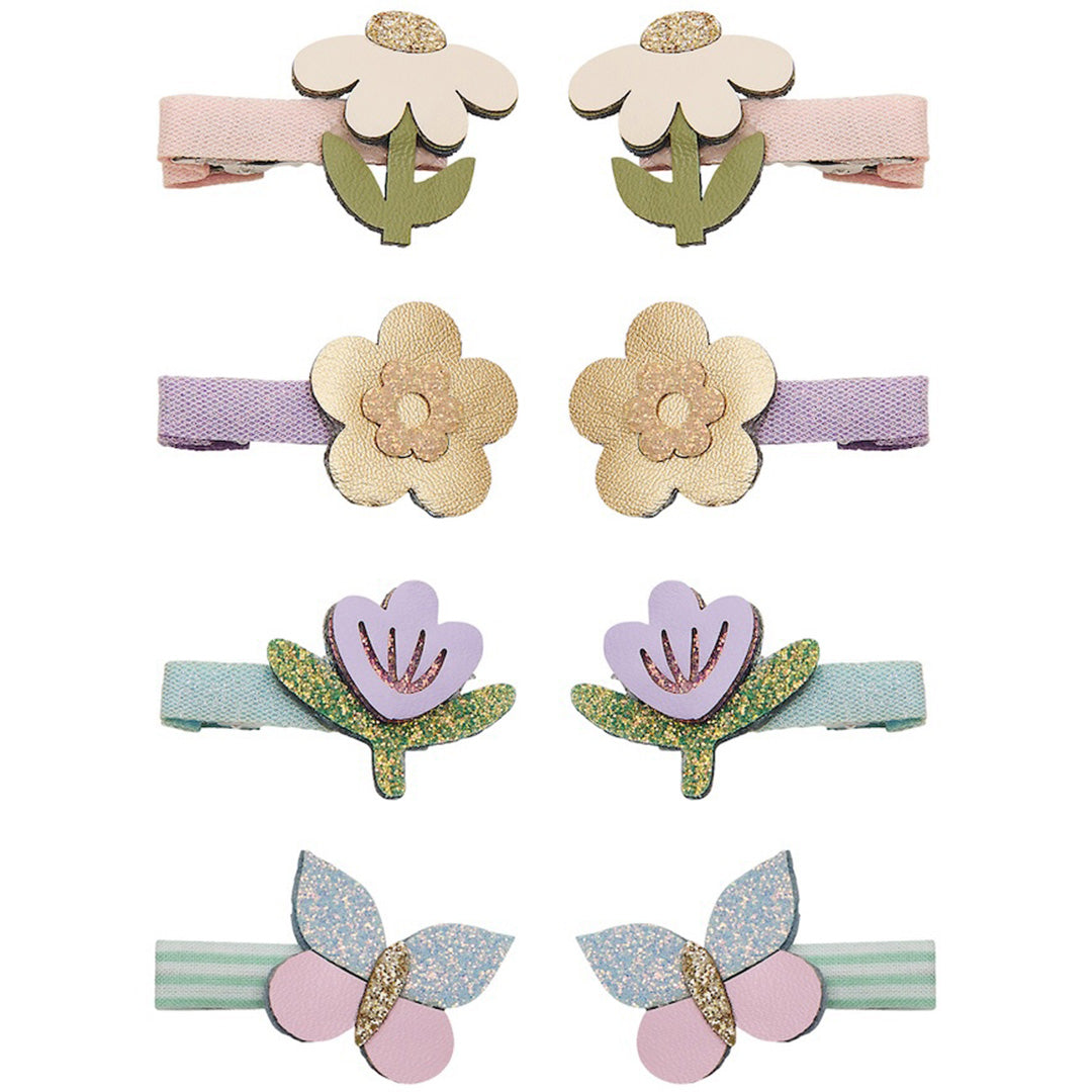 Mimi & Lula set van acht haarclipjes met bloemen en vlinders in pastelkleuren.