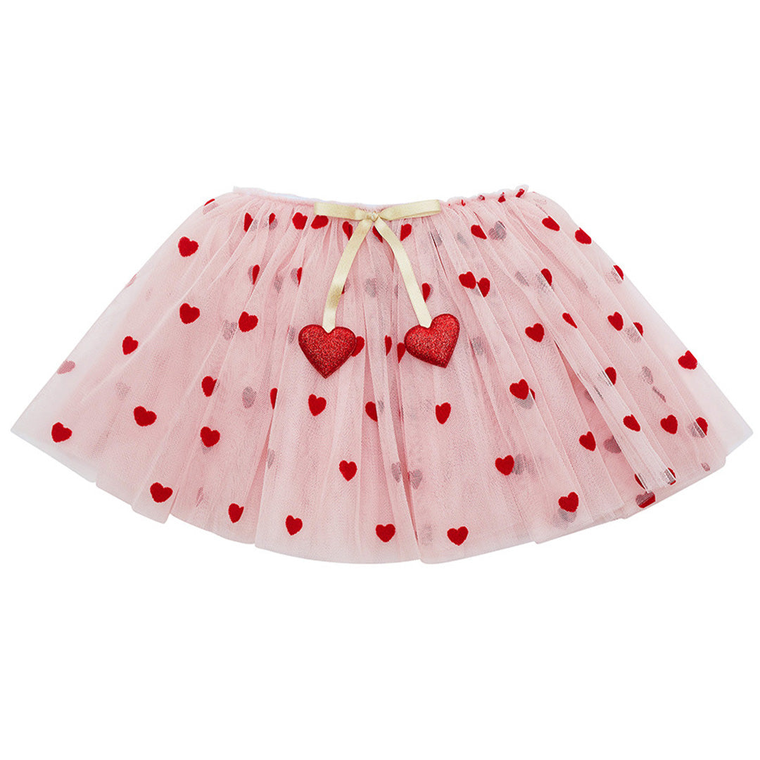 Mimi & Lula roze verkleedrok voor kinderen met rode harten en een strik met hartjes.