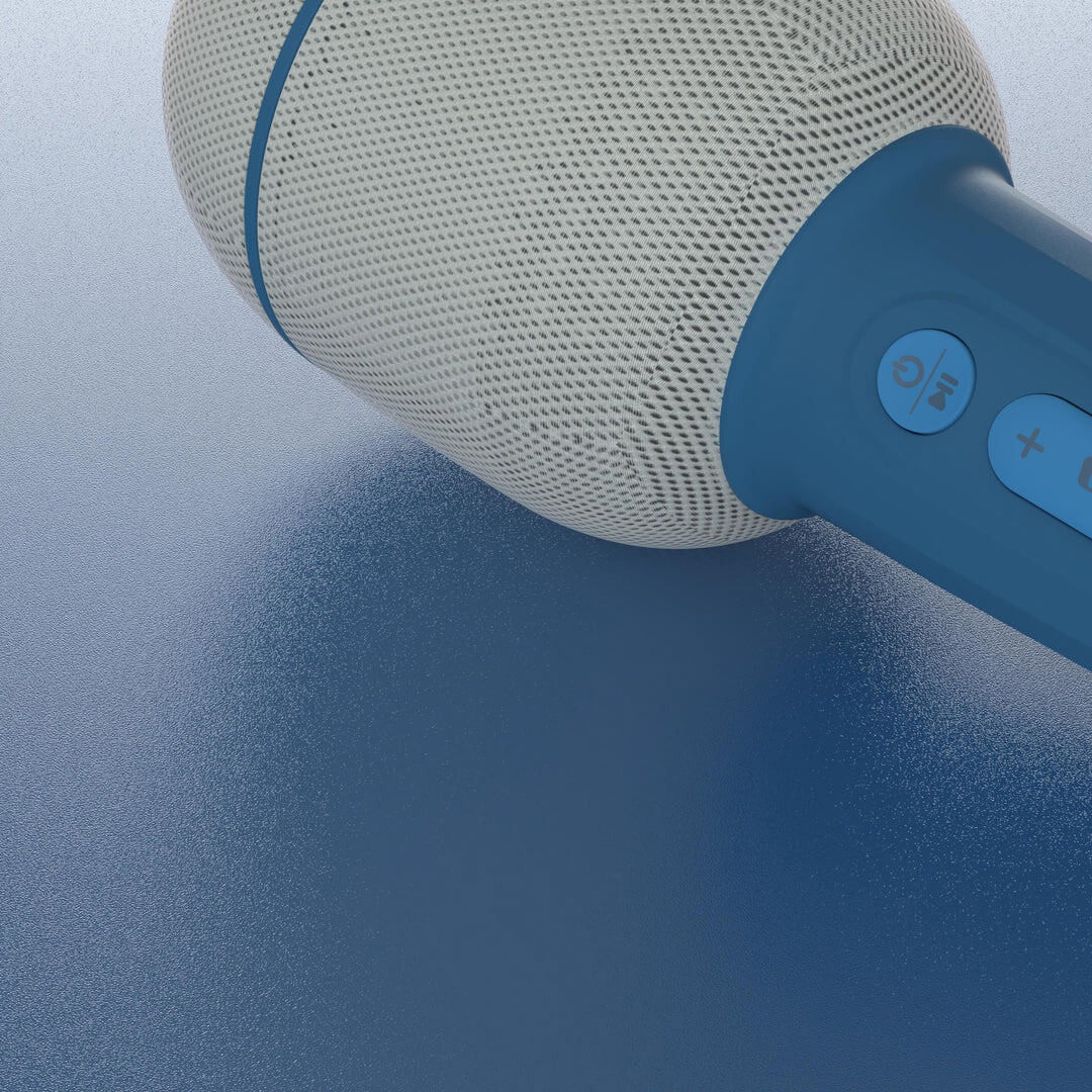Detailopname van de witte grille en blauwe knoppen van de karaoke microfoon.