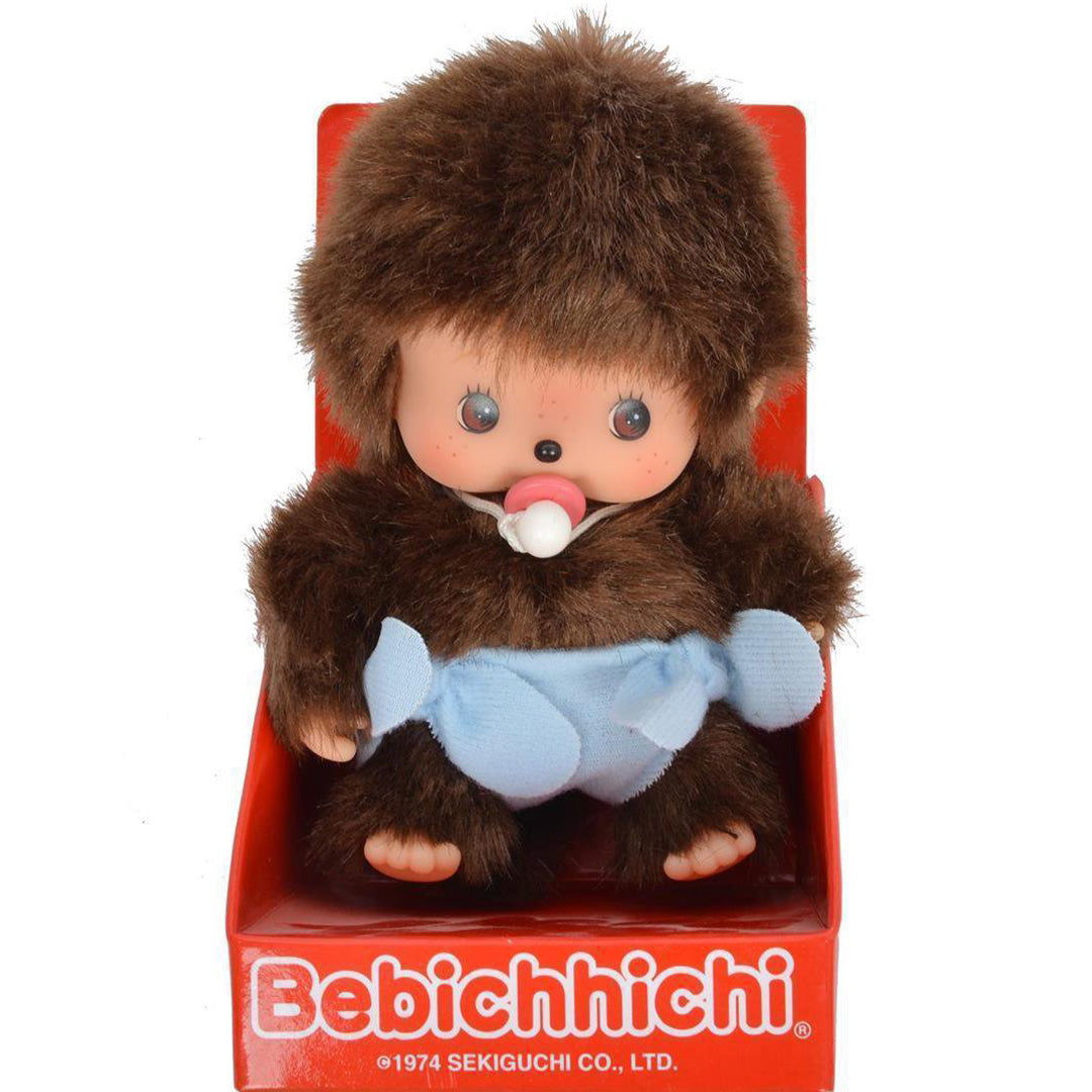 Monchhichi pluchen pop in rode verpakking met de tekst Bebichhichi.
