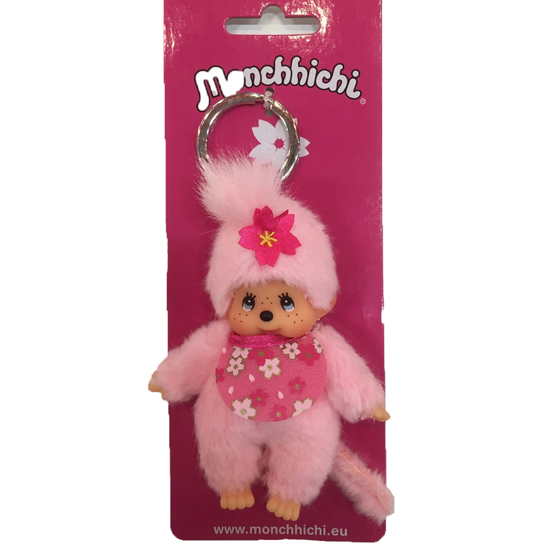 Monchhichi roze pluche sleutelhanger op de roze verpakking.