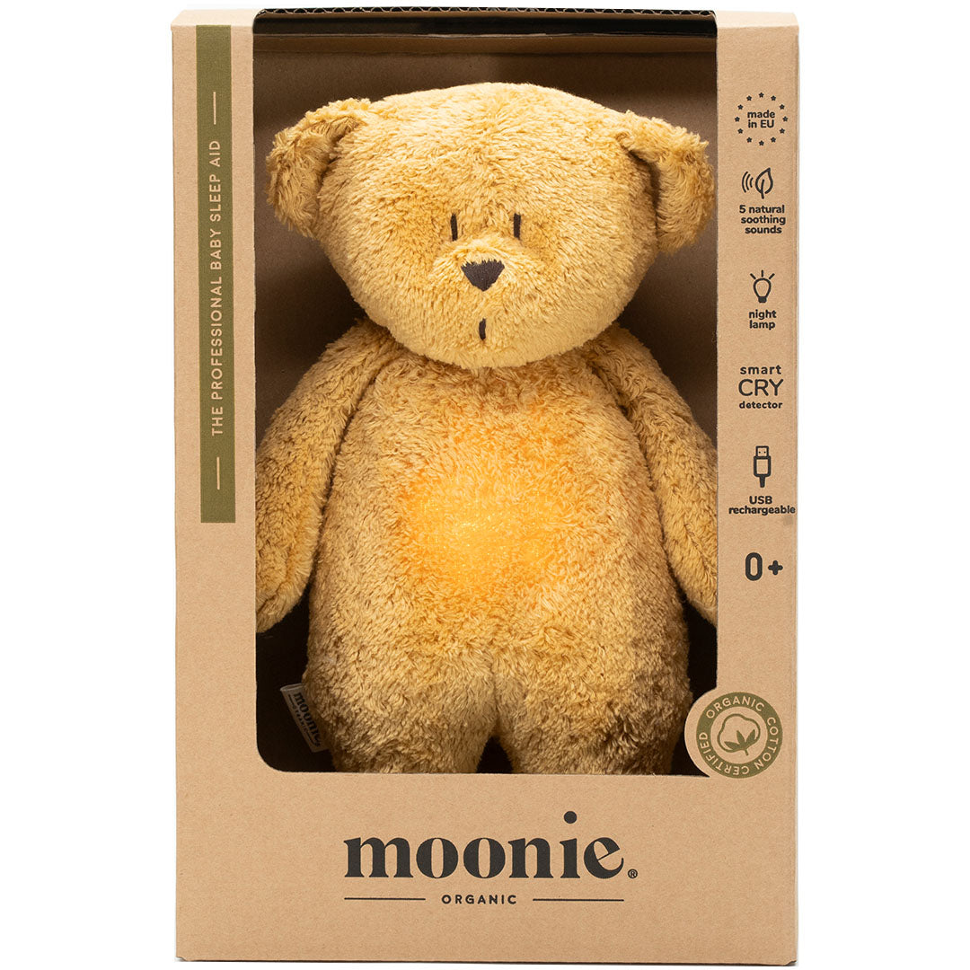 Moonie knuffelbeer met nachtlamp en geluid in de productverpakking.