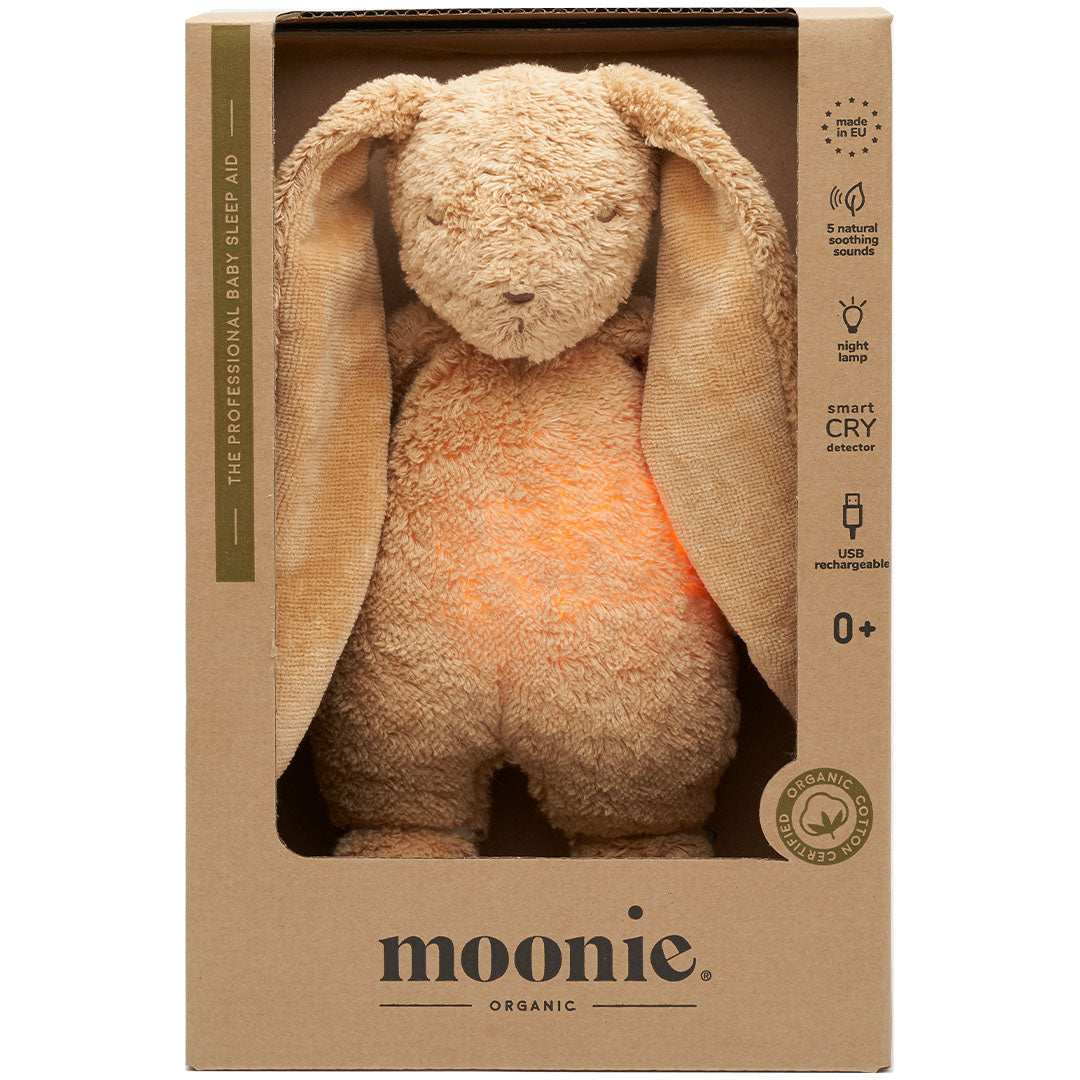 Verpakking van het Moonie knuffelkonijn met nachtlamp en geluid, met het konijn zichtbaar in de doos.