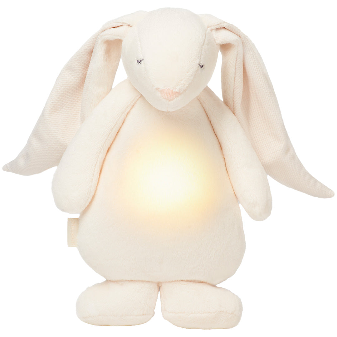 moonie knuffelkonijn met nachtlamp, staand met een zacht gloeiende buik.