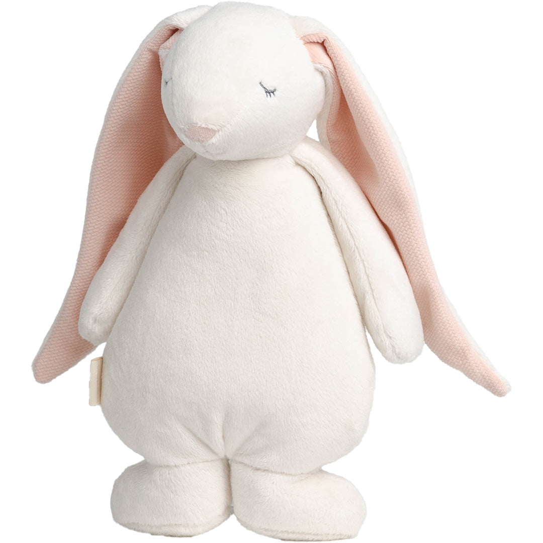 Moonie knuffelkonijn, een beige konijn met roze oren en gesloten ogen.