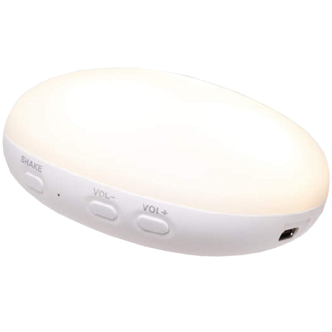 Het witte, ovale binnenwerk van het Moonie knuffelkonijn met verlichting en knoppen.