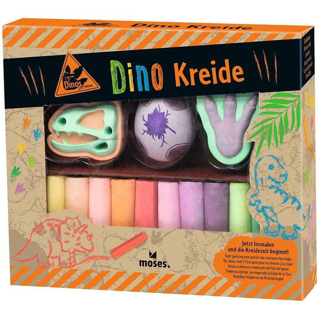 De verpakking van moses. stoepkrijt dino met drie dinovormige krijtjes en een reeks kleurrijke krijtstiften.