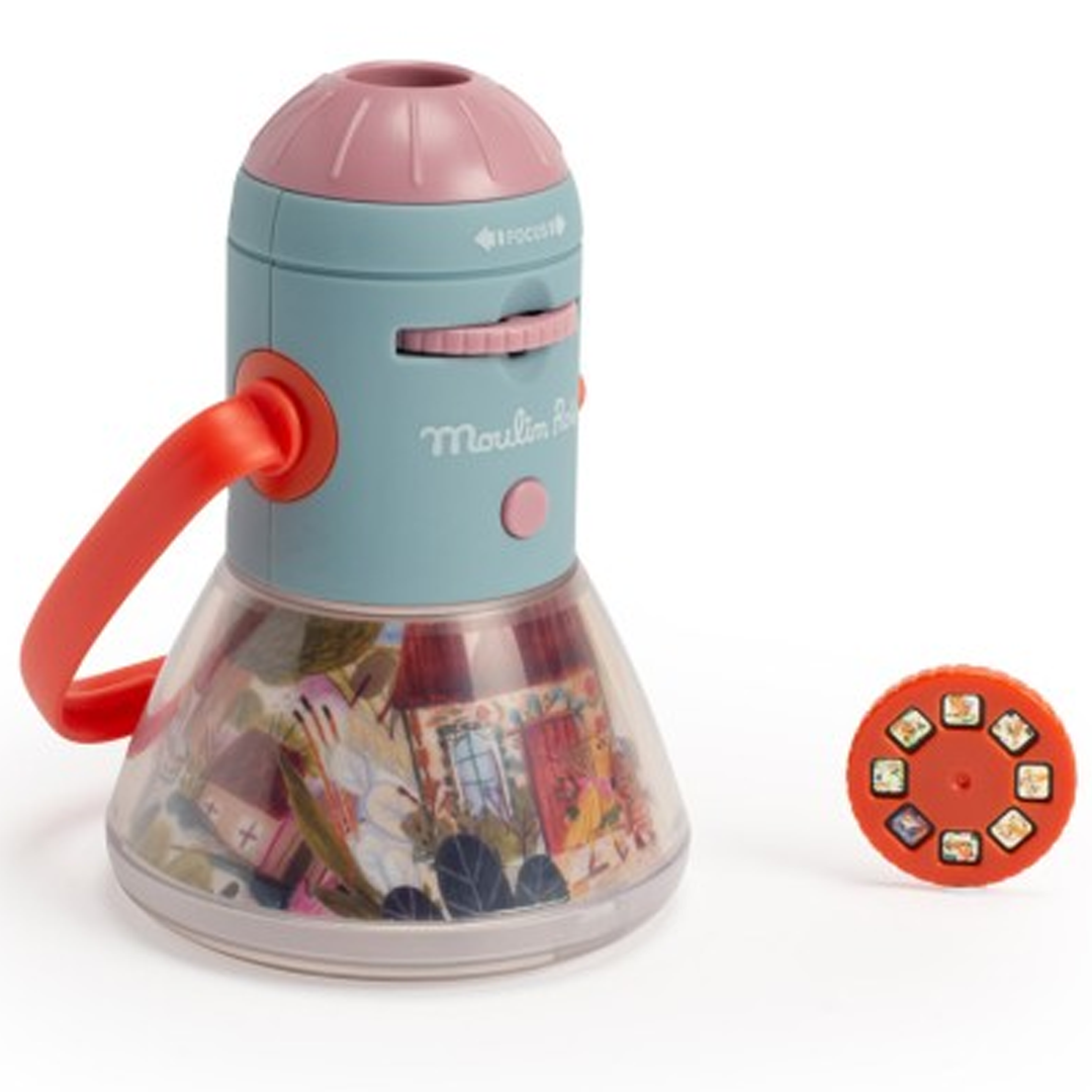 Moulin Roty 3-in-1 projector met een oranje verhalen disc.