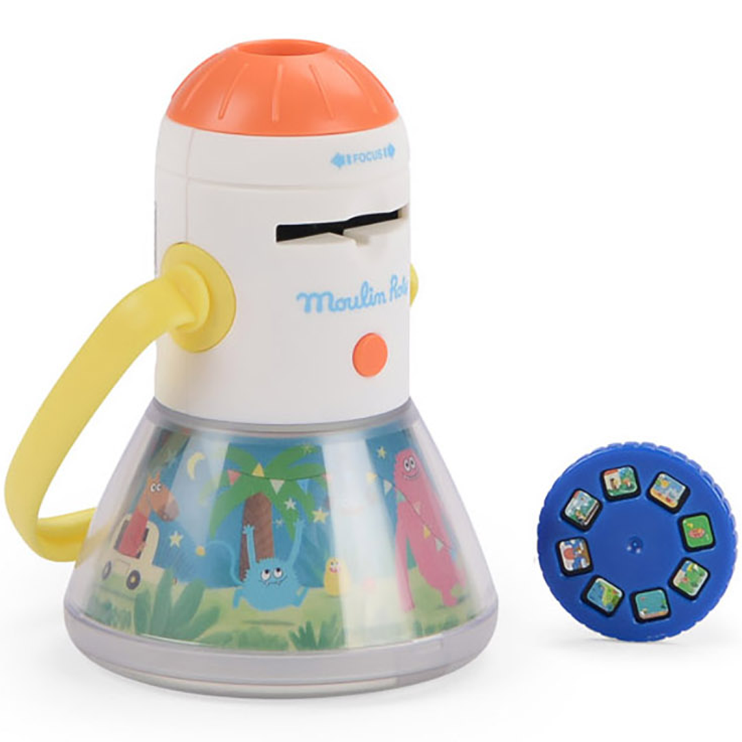 De Moulin Roty 3-in-1 projector met Les Schmouks figuren op de basis, naast een blauwe projectieschijf.