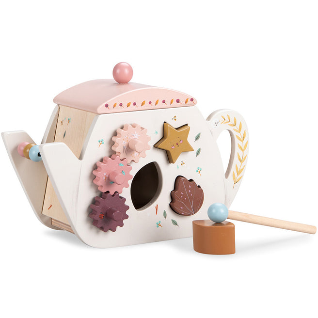 Moulin Roty houten activiteitenkubus in de vorm van een theepot met tandwielen, vormpjes en een hamer met bal.