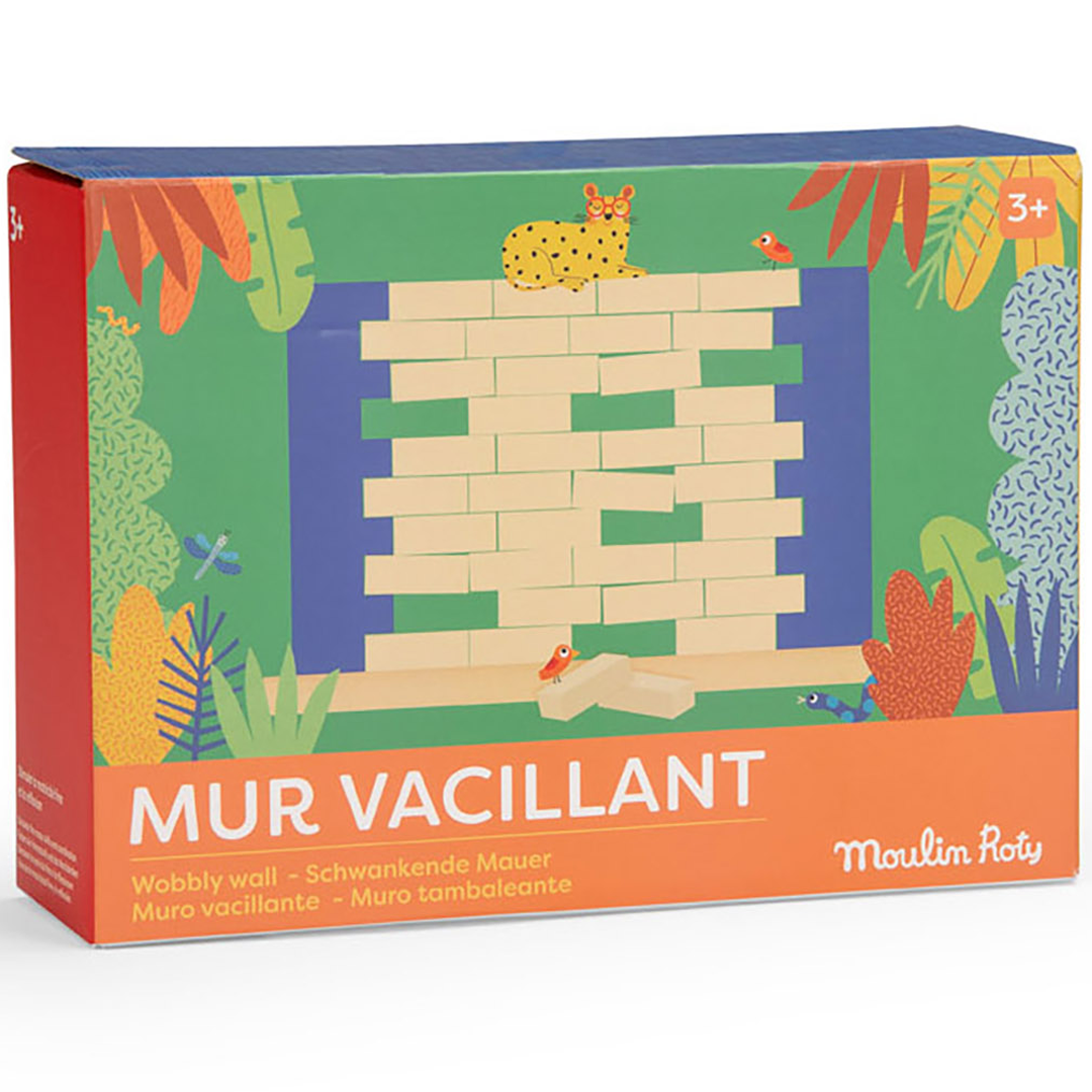 De verpakking van het Moulin Roty balansspel met een illustratie van de wiebelende wand en een kat in een jungle-thema.
