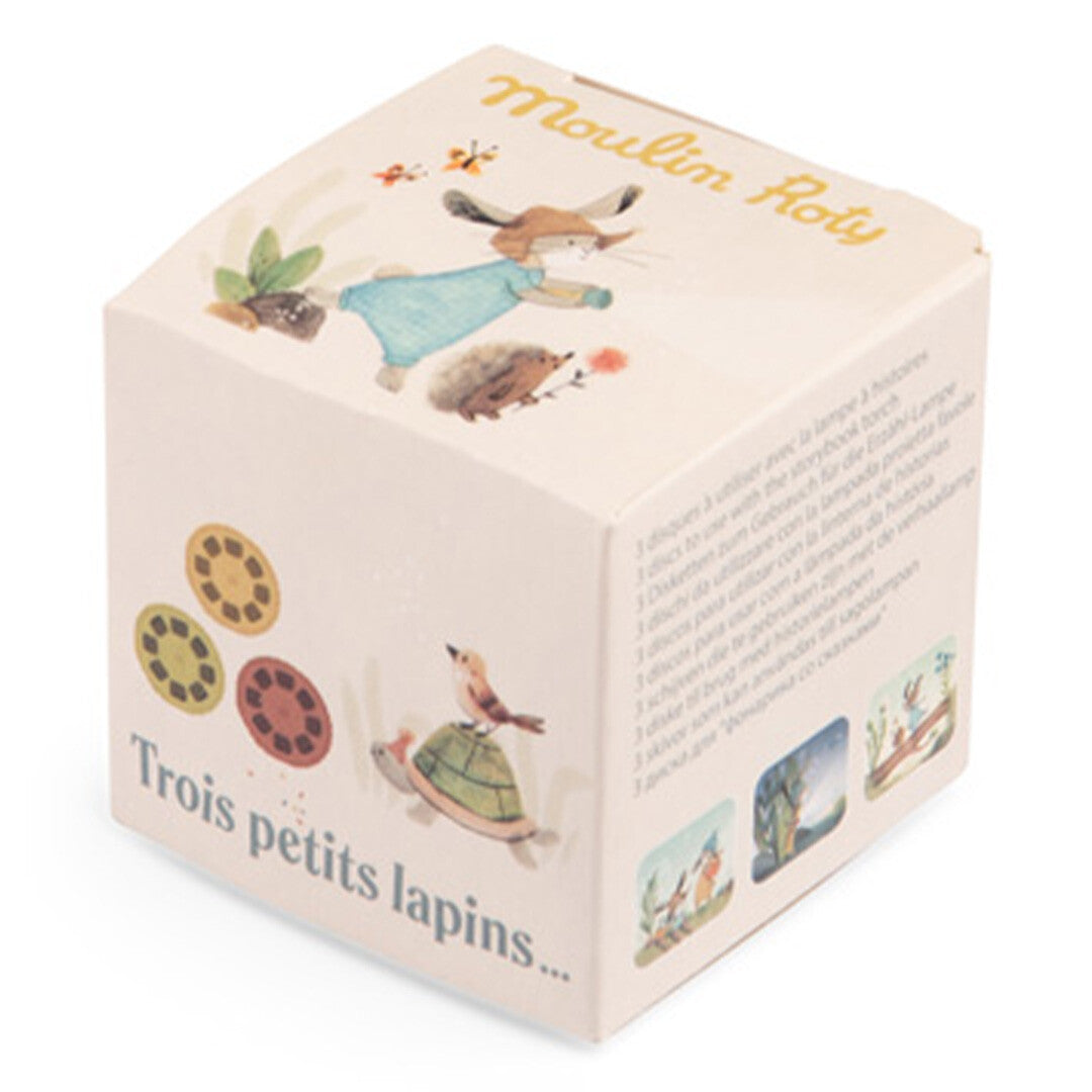 De Moulin Roty verpakking van de projector discs met illustraties van konijnen, een egel en een schildpad.